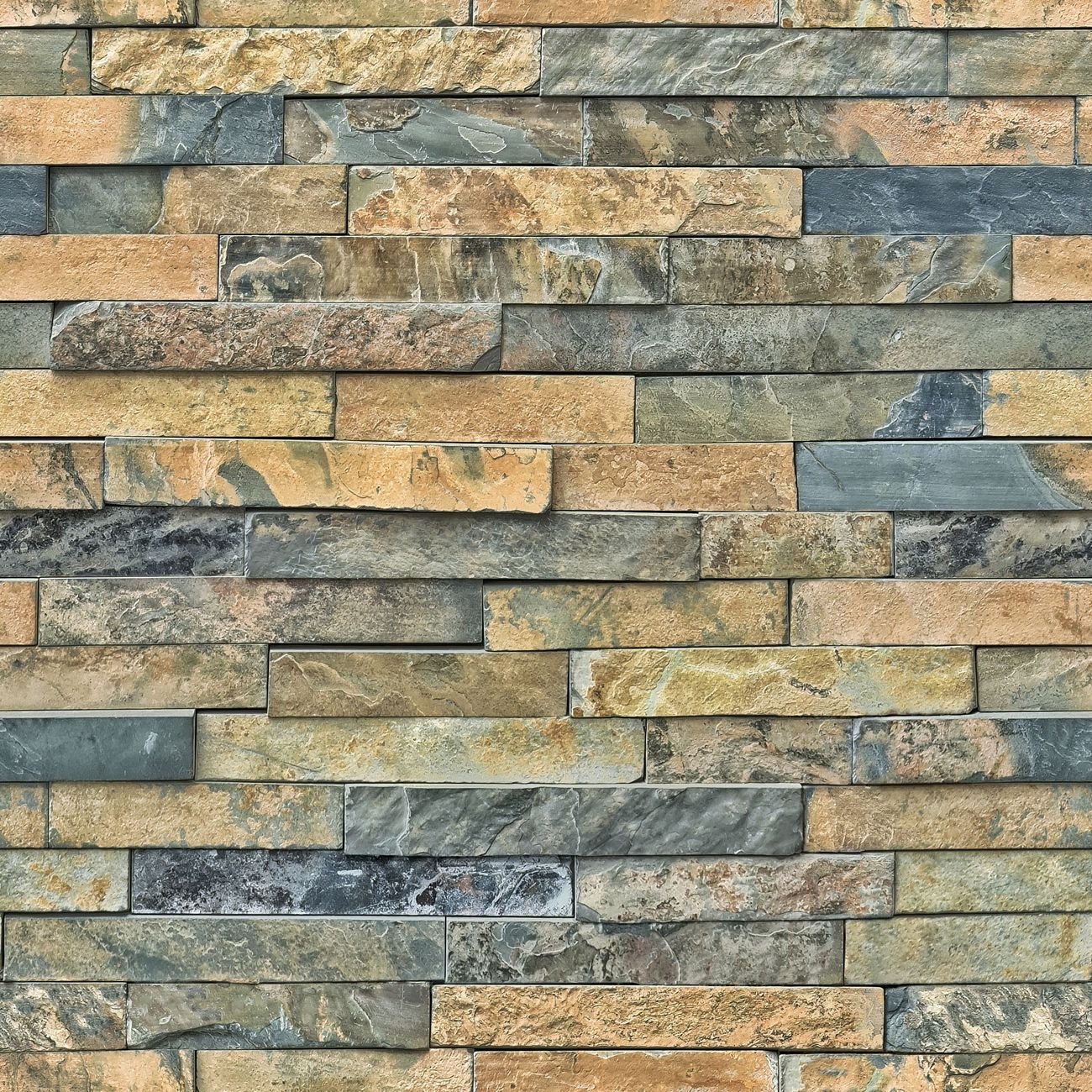 Close-up of natural stone brick wall showing rich texture and color variation