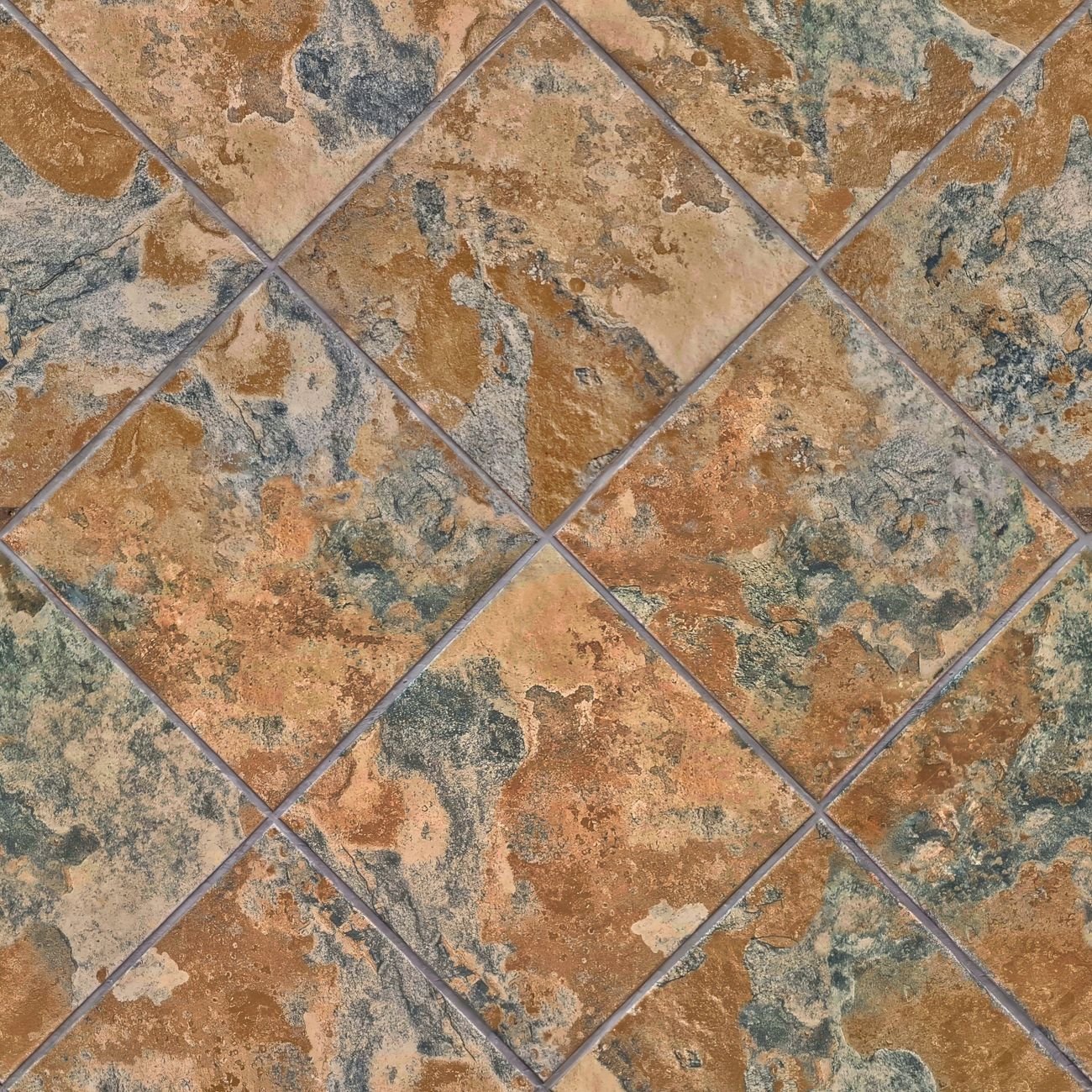 Close-up of patterned ceramic floor tiles with warm earthy tones and geometric texture
