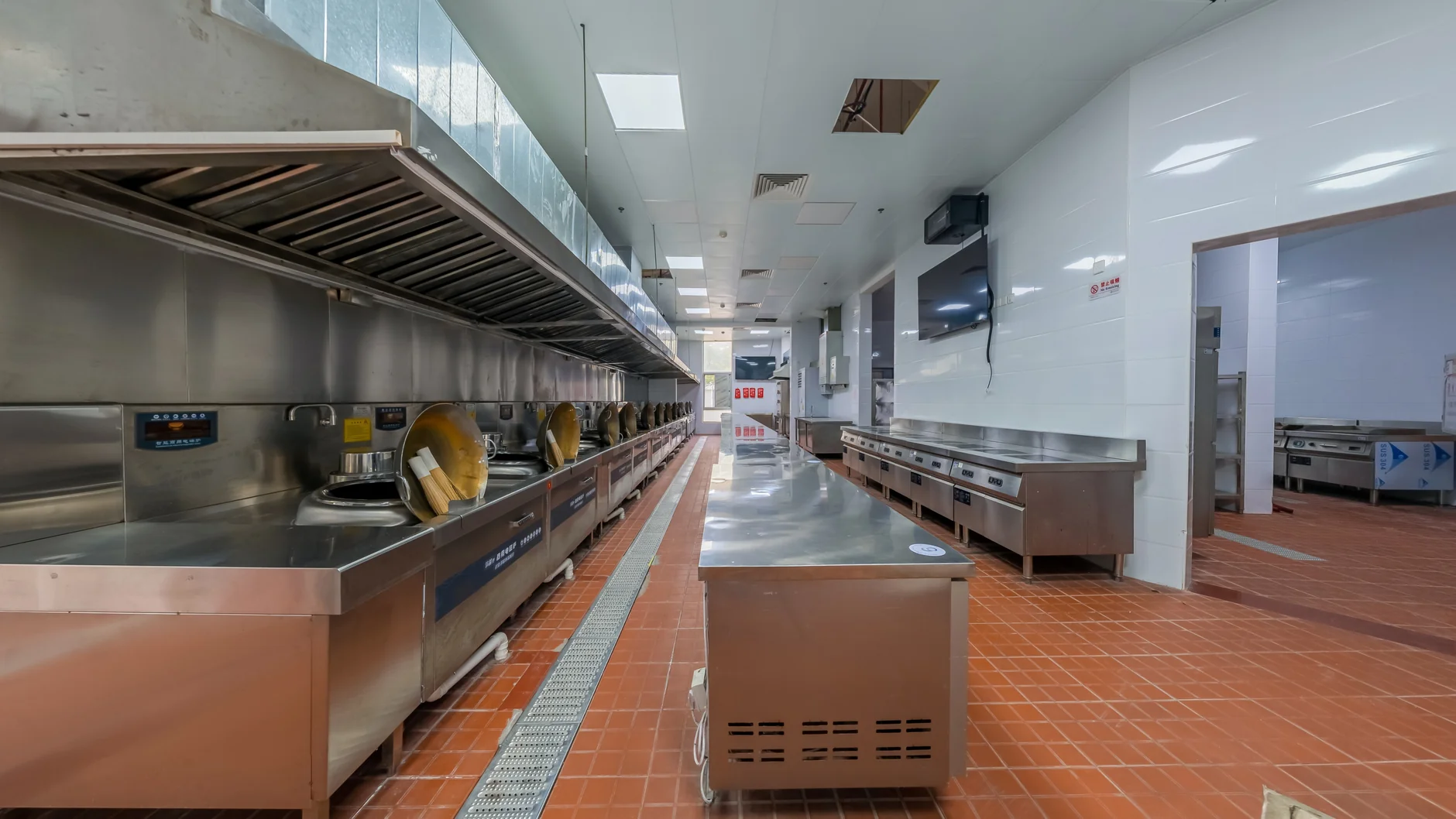 Modern space with large format tile flooring, clean industrial aesthetic